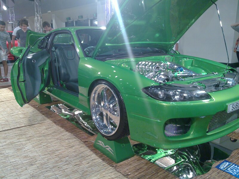 green modified car on display