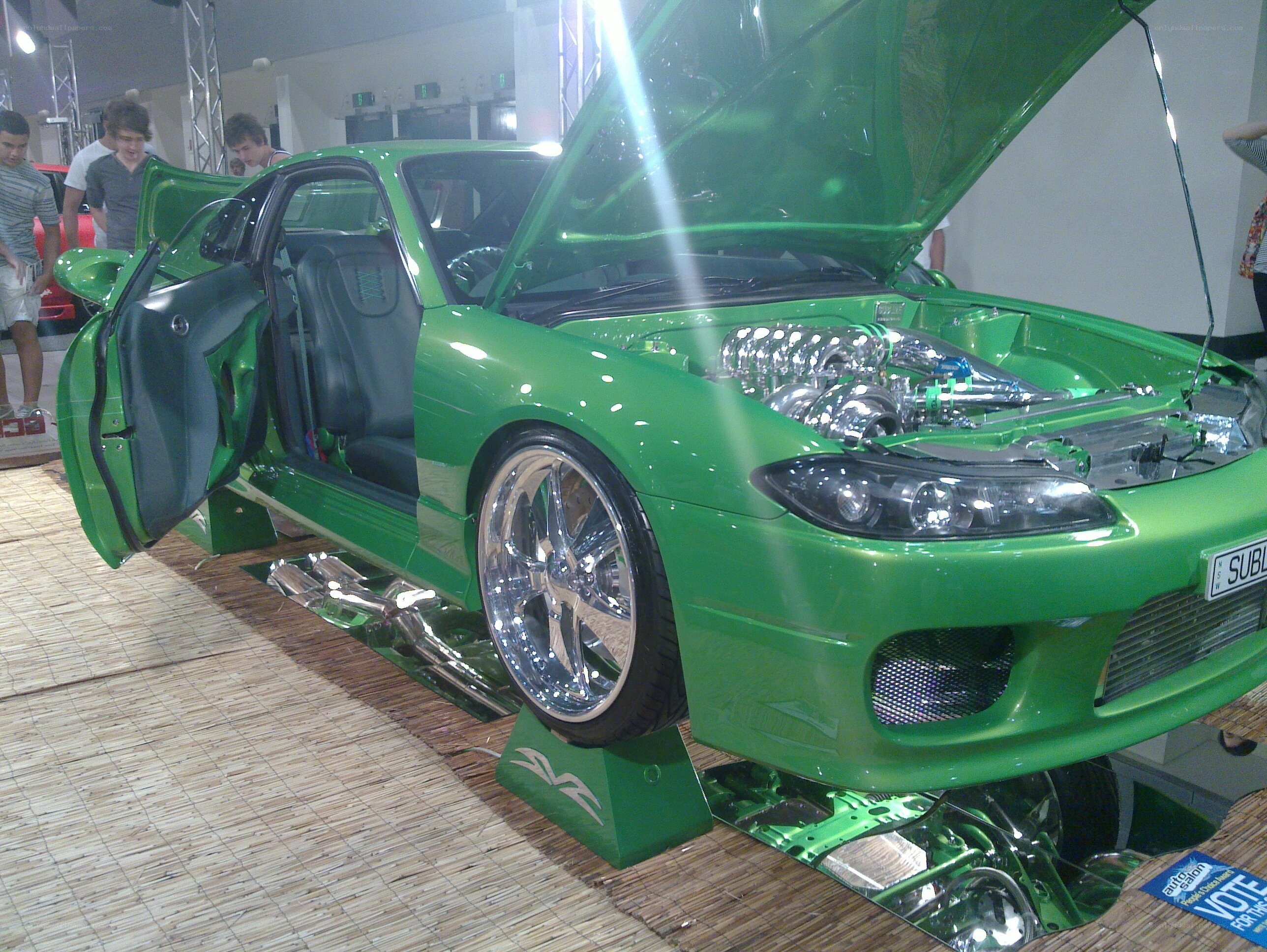 green modified car on display