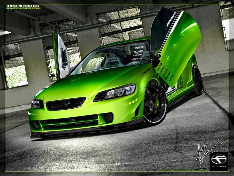 green modified car with doors open