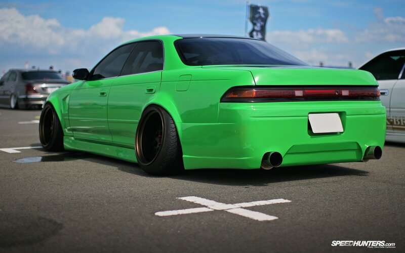 green modified sedan car