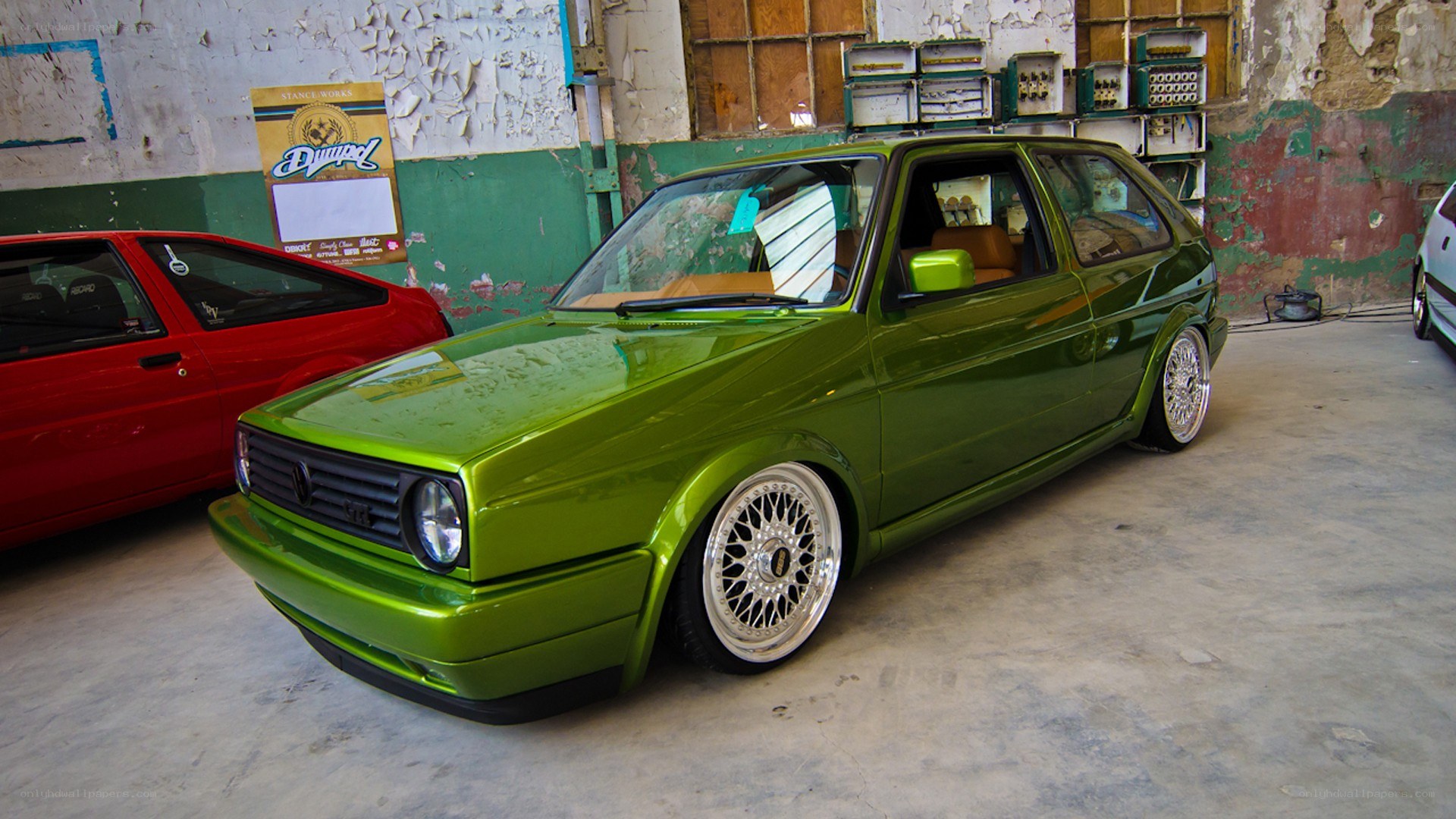 Green modified Volkswagen hatchback