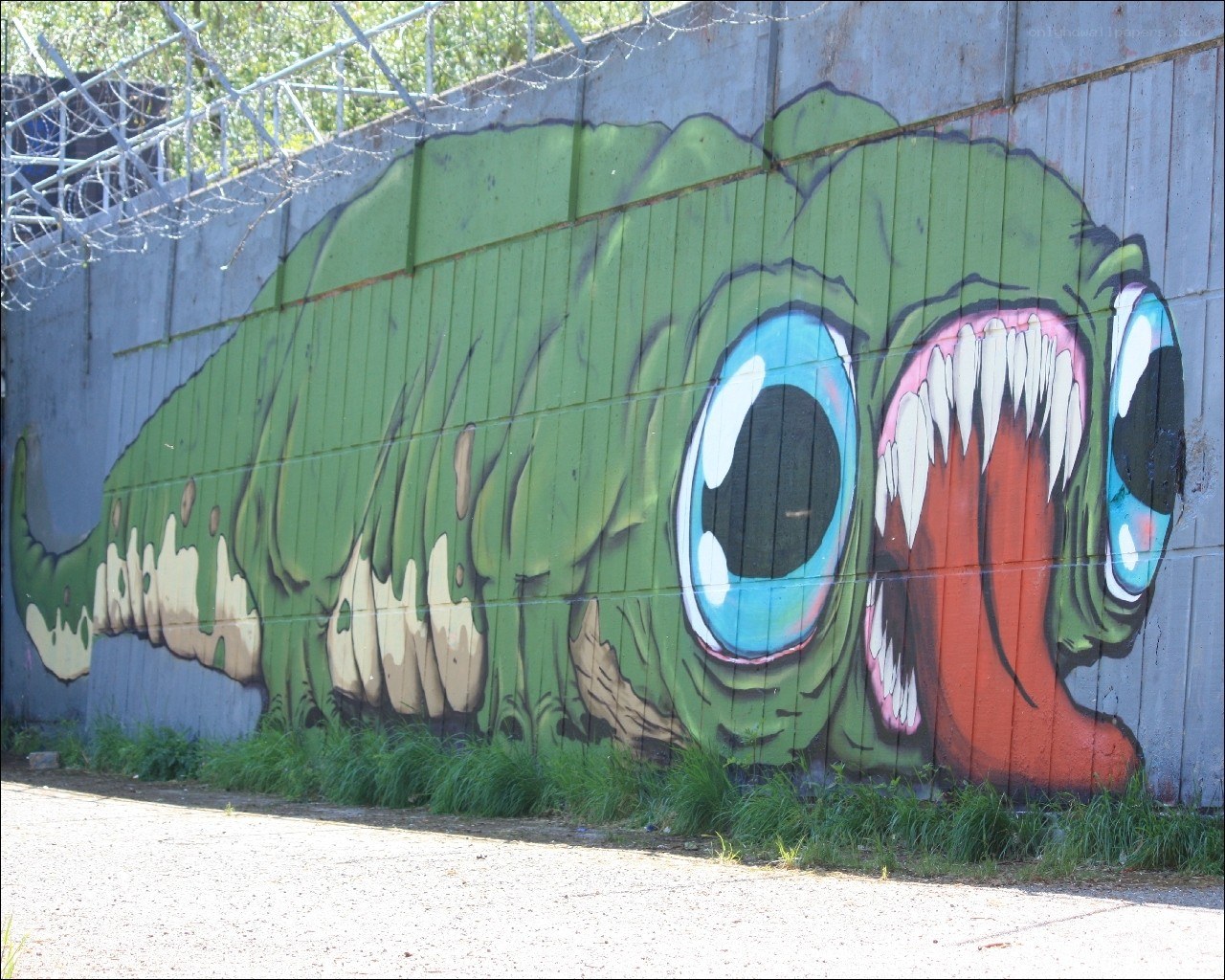Green monster graffiti mural