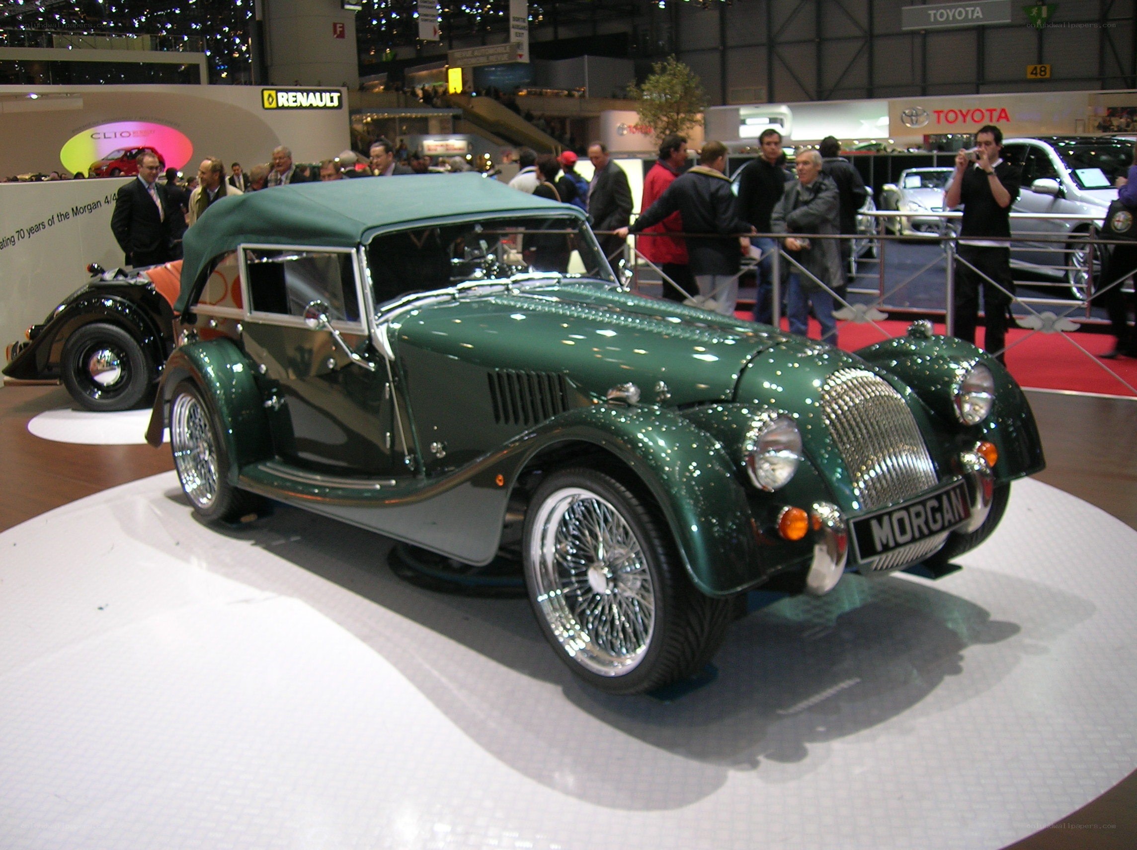 Green Morgan car at auto show