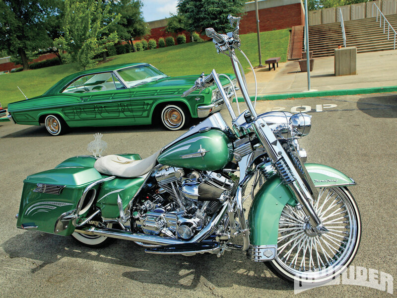 Green Motorcycle and Car