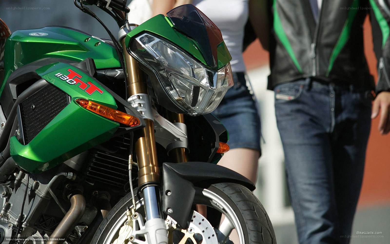 green motorcycle at an event