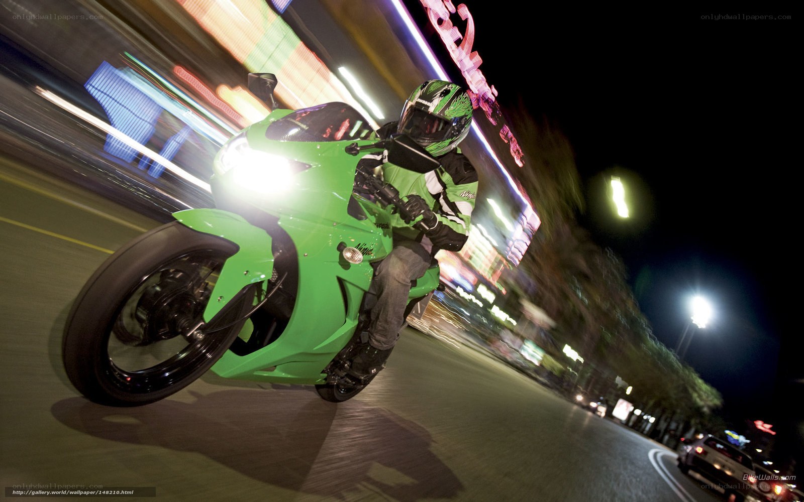 Green motorcycle at night