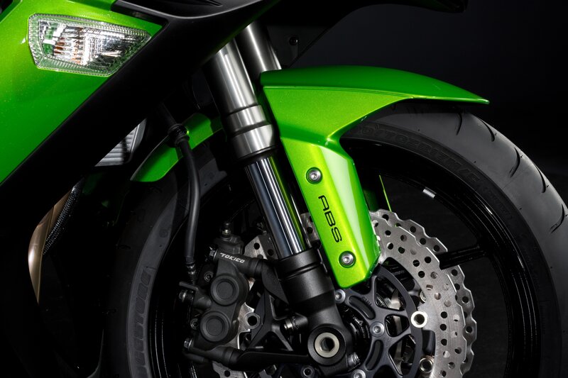 green motorcycle front wheel