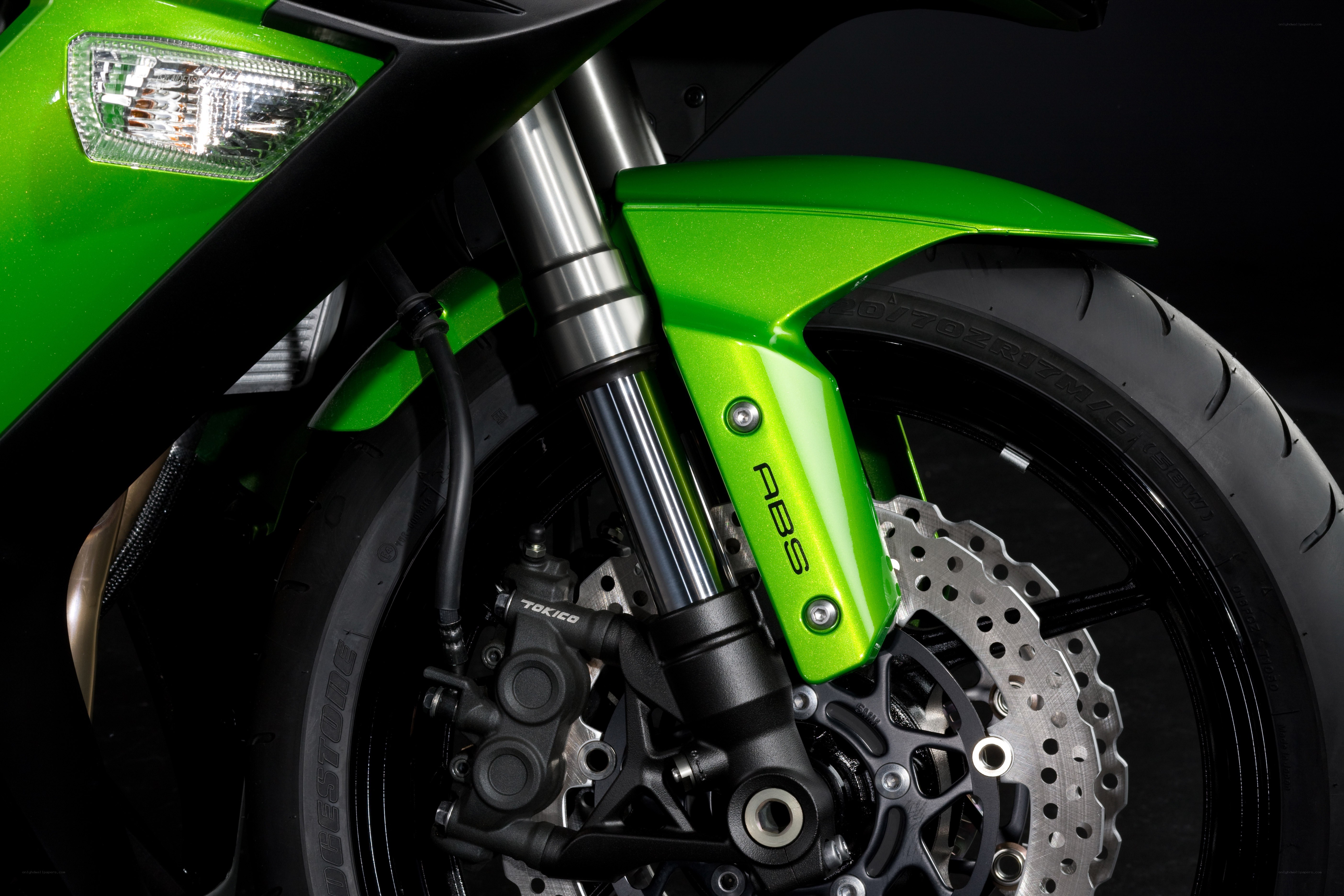 green motorcycle front wheel
