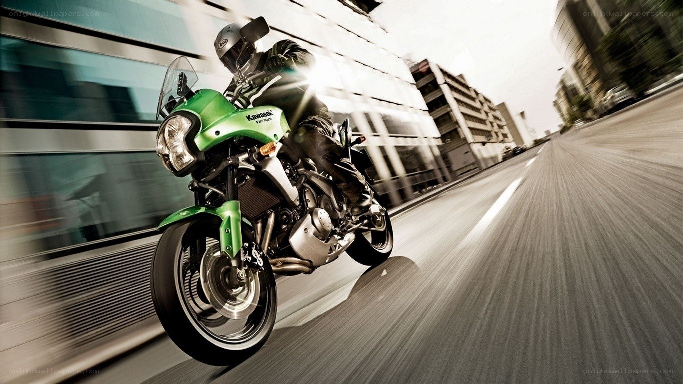 Green motorcycle in city