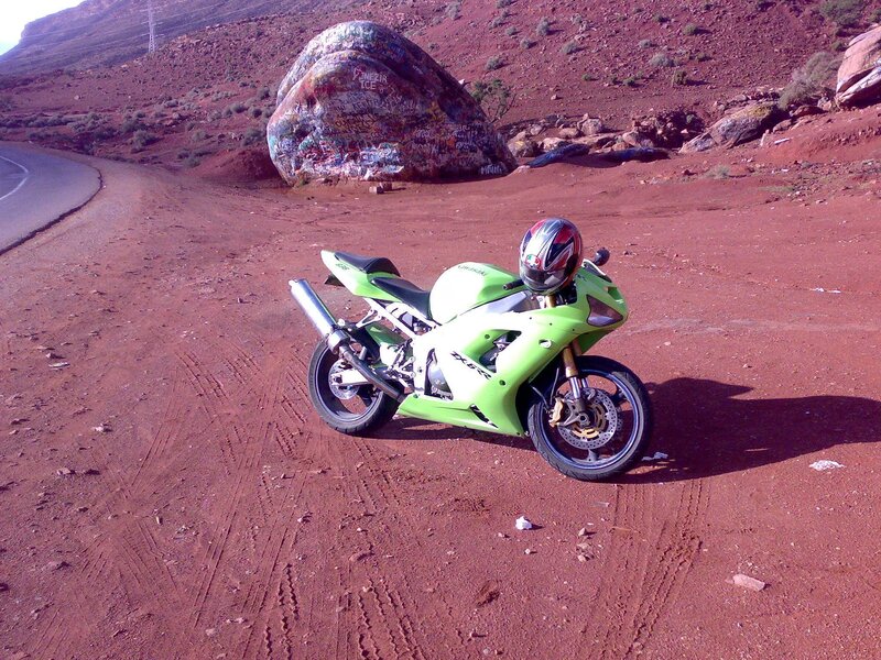 Green Motorcycle on Dirt