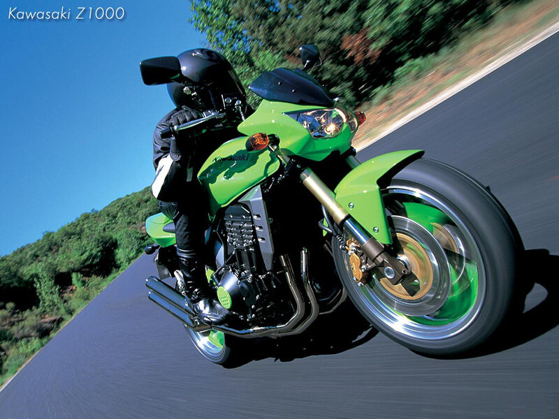 Green Motorcycle on Road — Dynamic