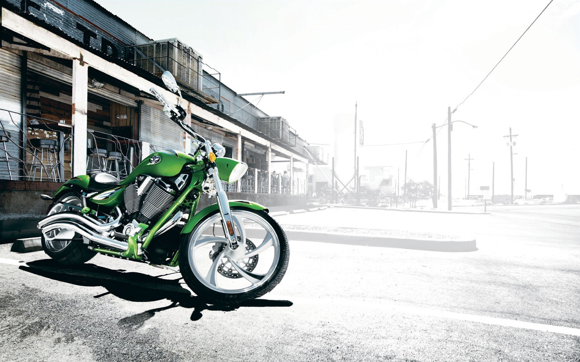 Green motorcycle on street