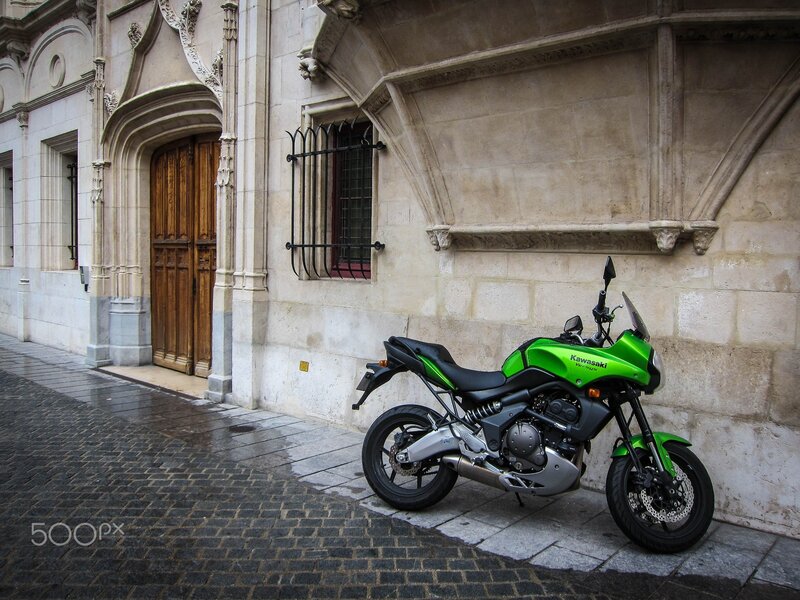 Green Motorcycle on Street — Calm