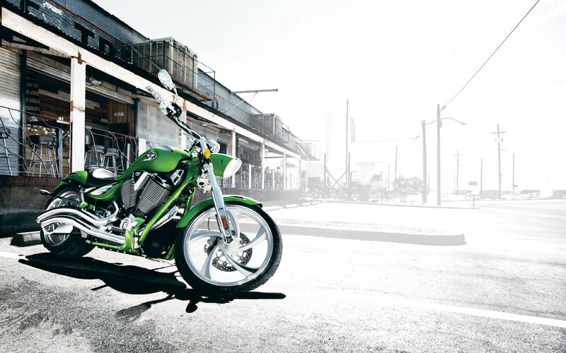 Green Motorcycle on Street — Dramatic