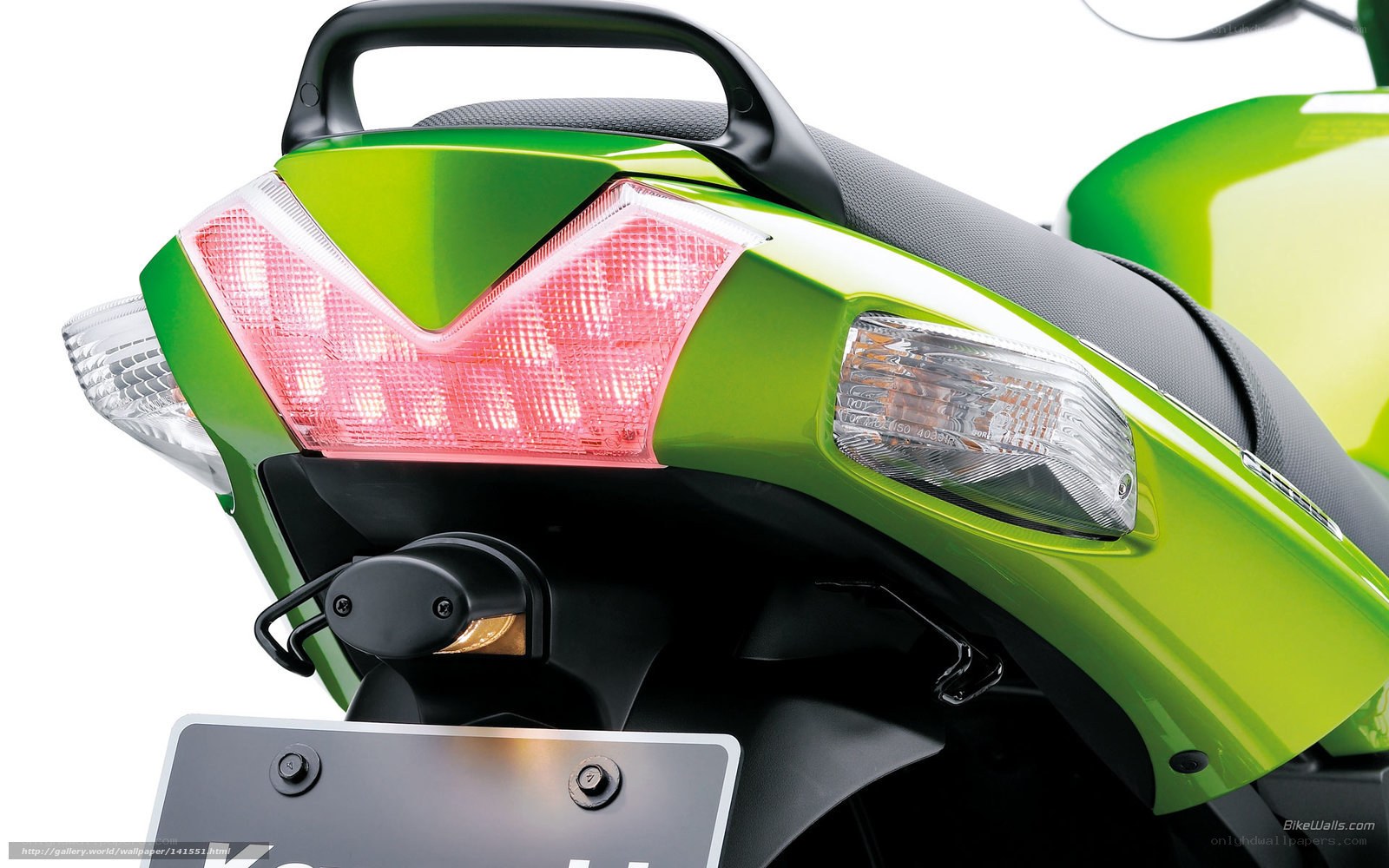 green motorcycle rear view