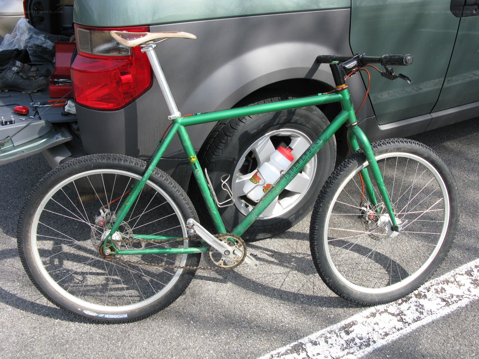 green mountain bike parked