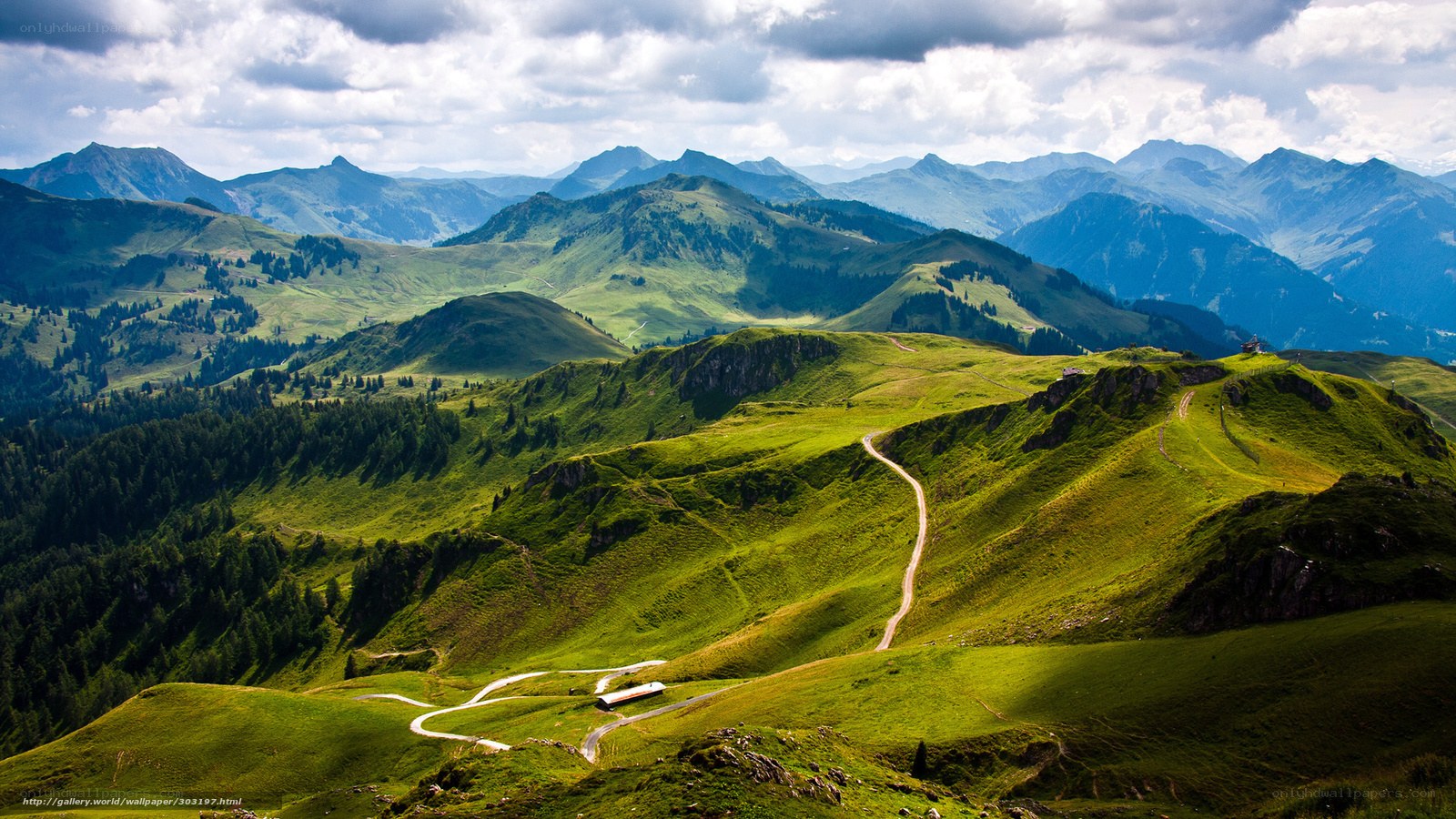 Green mountain landscape with winding road