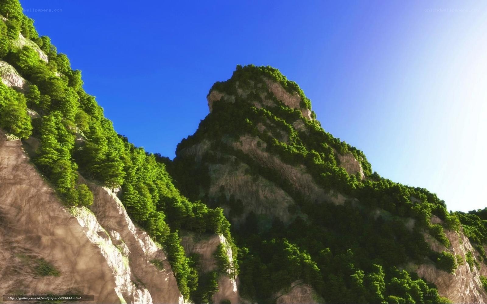 Green mountain under blue sky