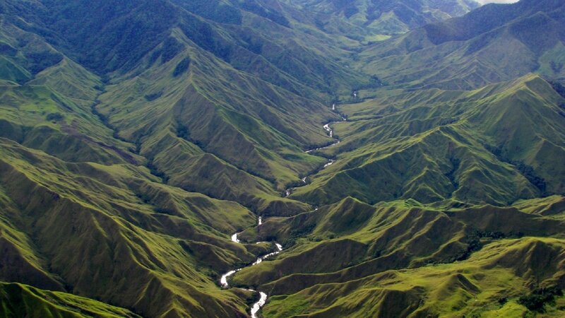 Green mountain valley with river