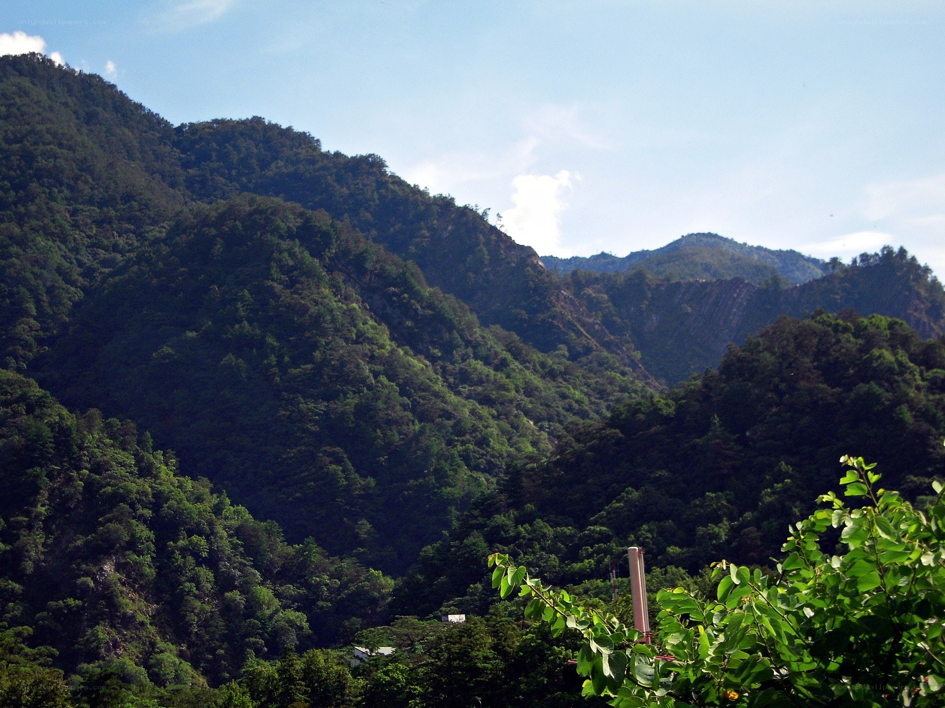 green mountains under blue sky