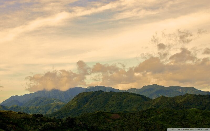 Green Mountains under Clouds