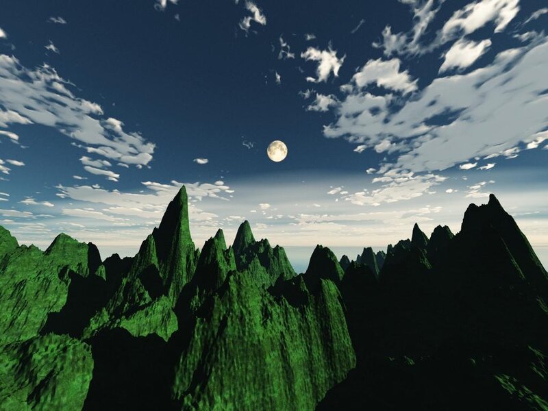 green mountains under moonlight