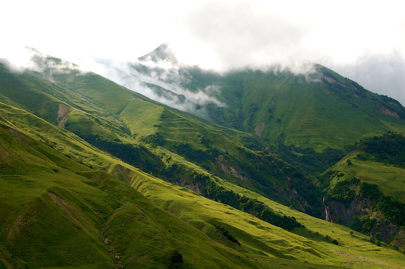 Green mountains with clouds