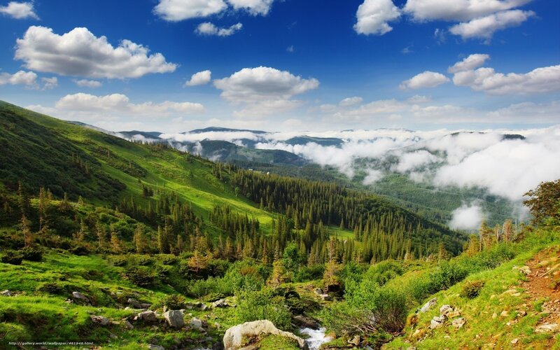 Green mountains with clouds