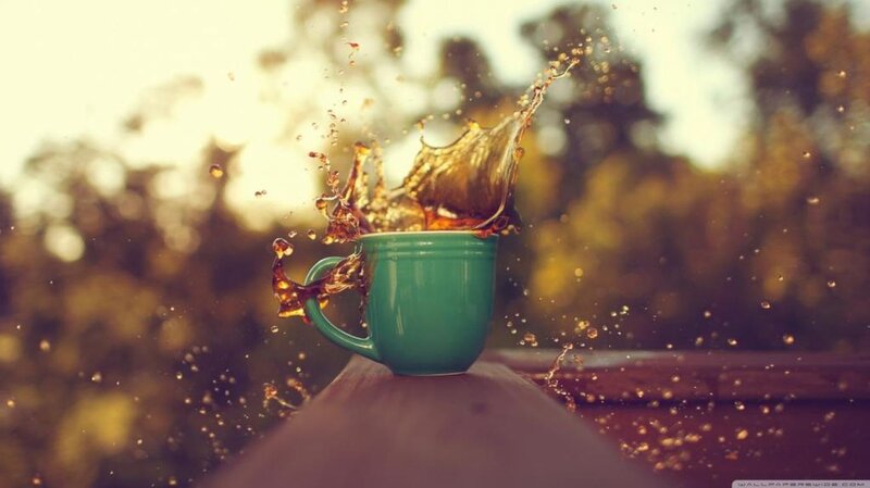 Green Mug Splashing Coffee
