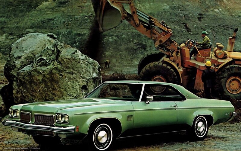 Green muscle car at quarry