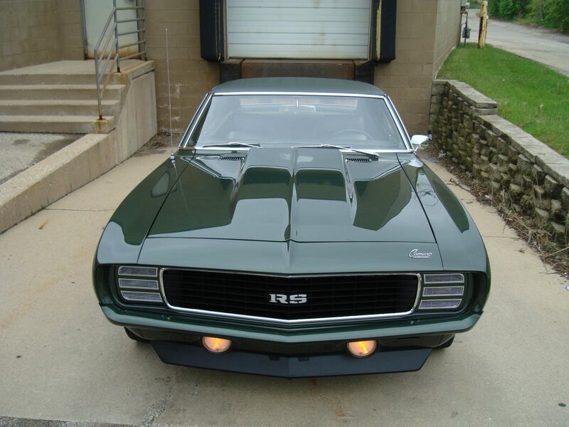 Green Muscle Car — Calm, Afternoon, Photograph, Building