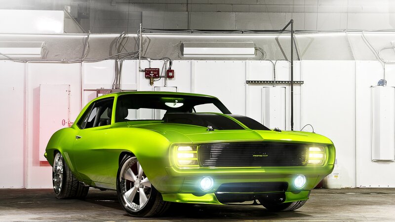 green muscle car in garage