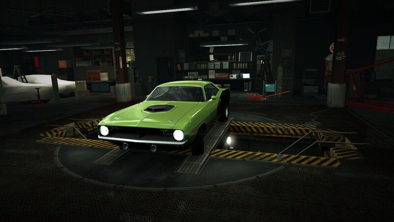 green muscle car in garage