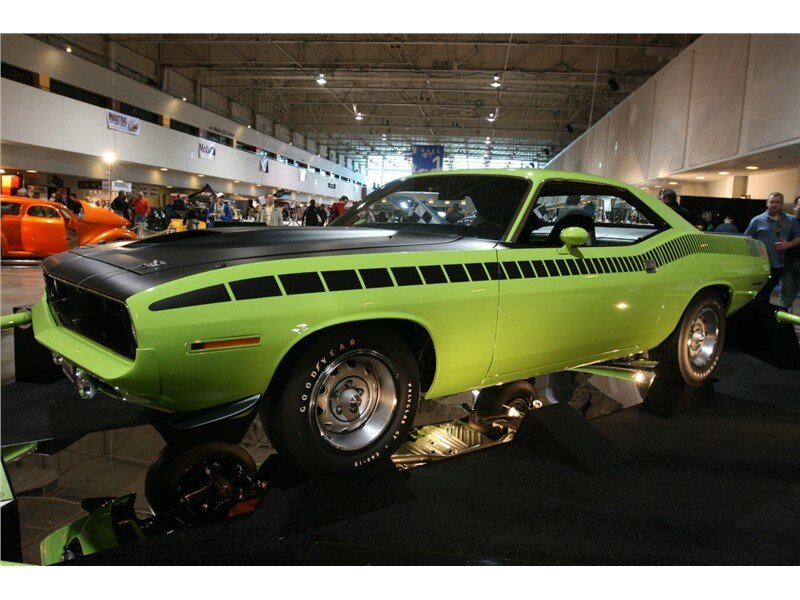 Green muscle car on display