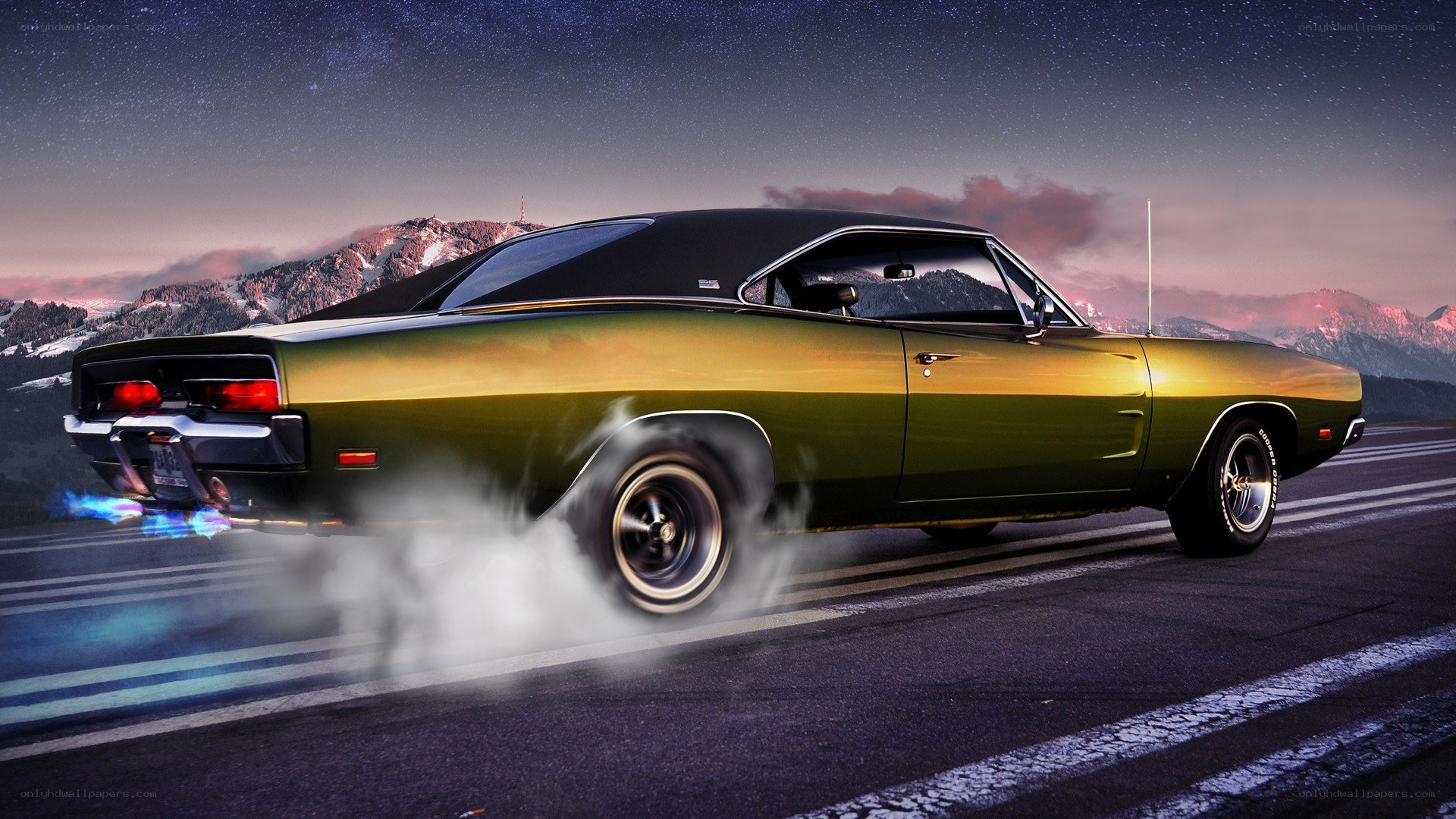 Green muscle car on mountain road