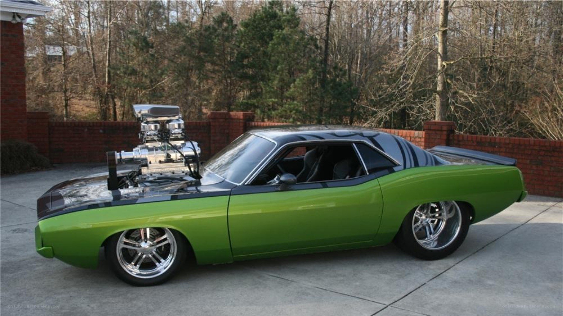 green muscle car with supercharger