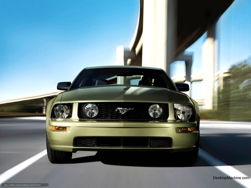 Green Mustang on highway