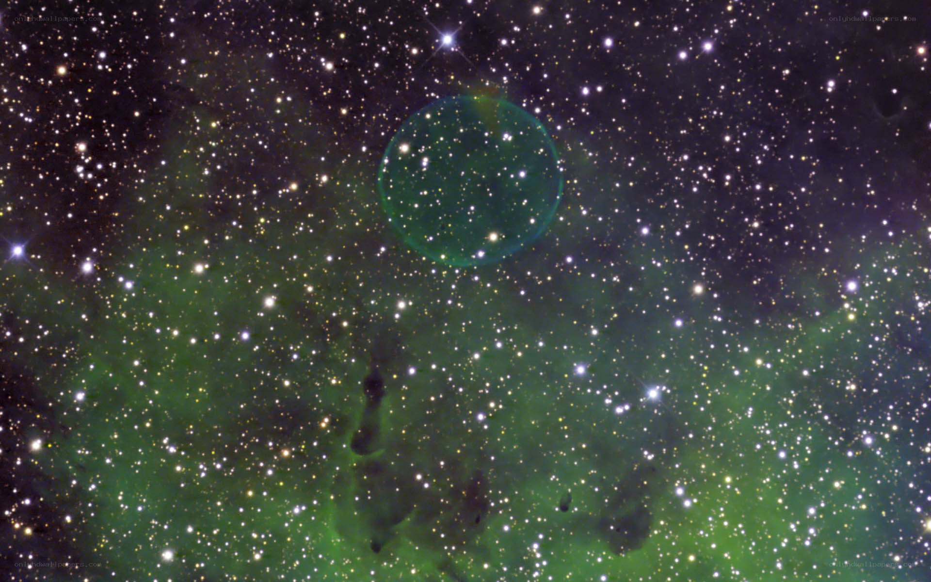 Green nebula in starfield