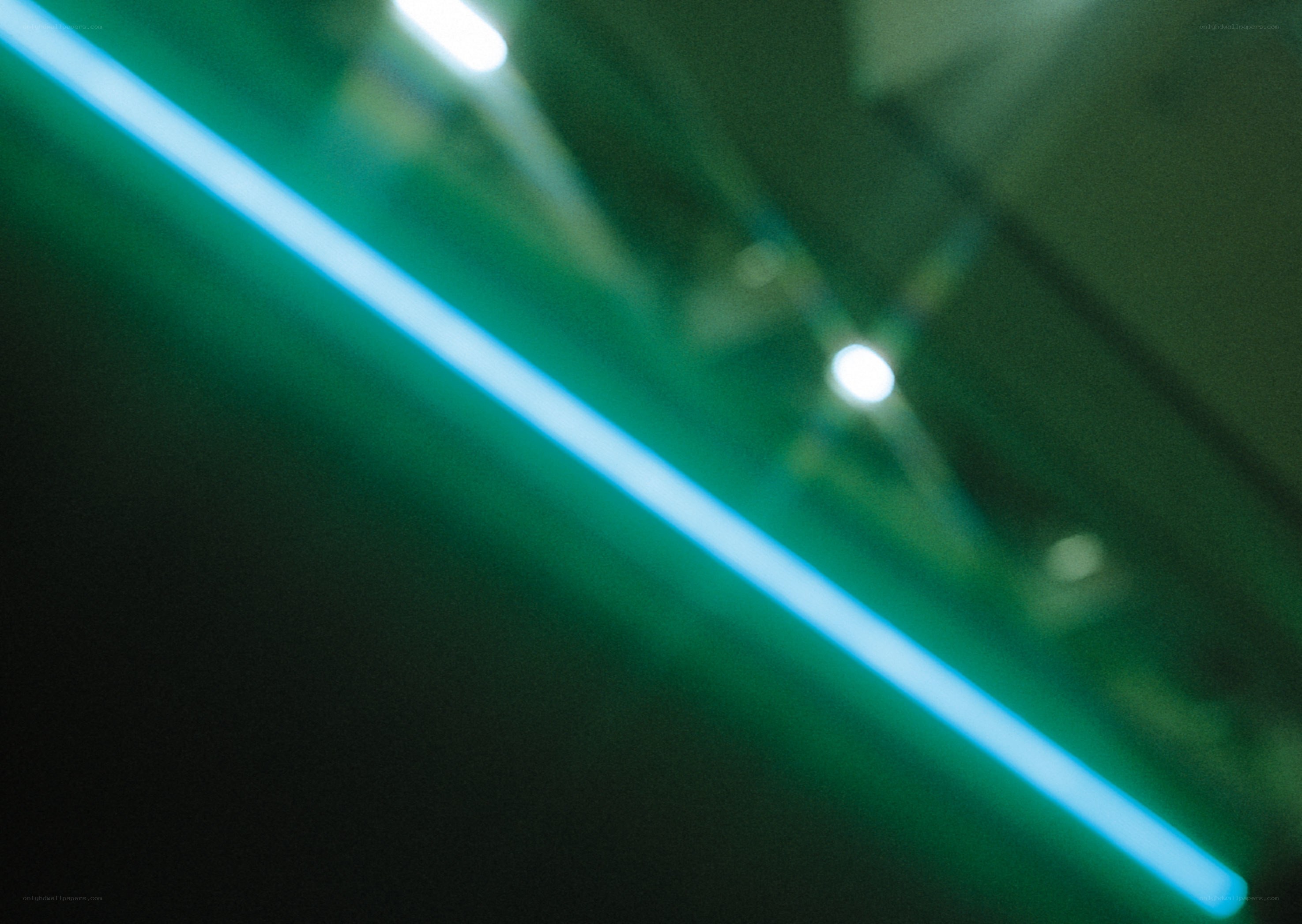 green neon light in dark room