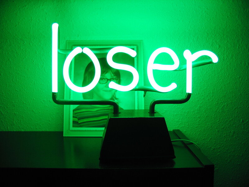 green neon 'loser' sign