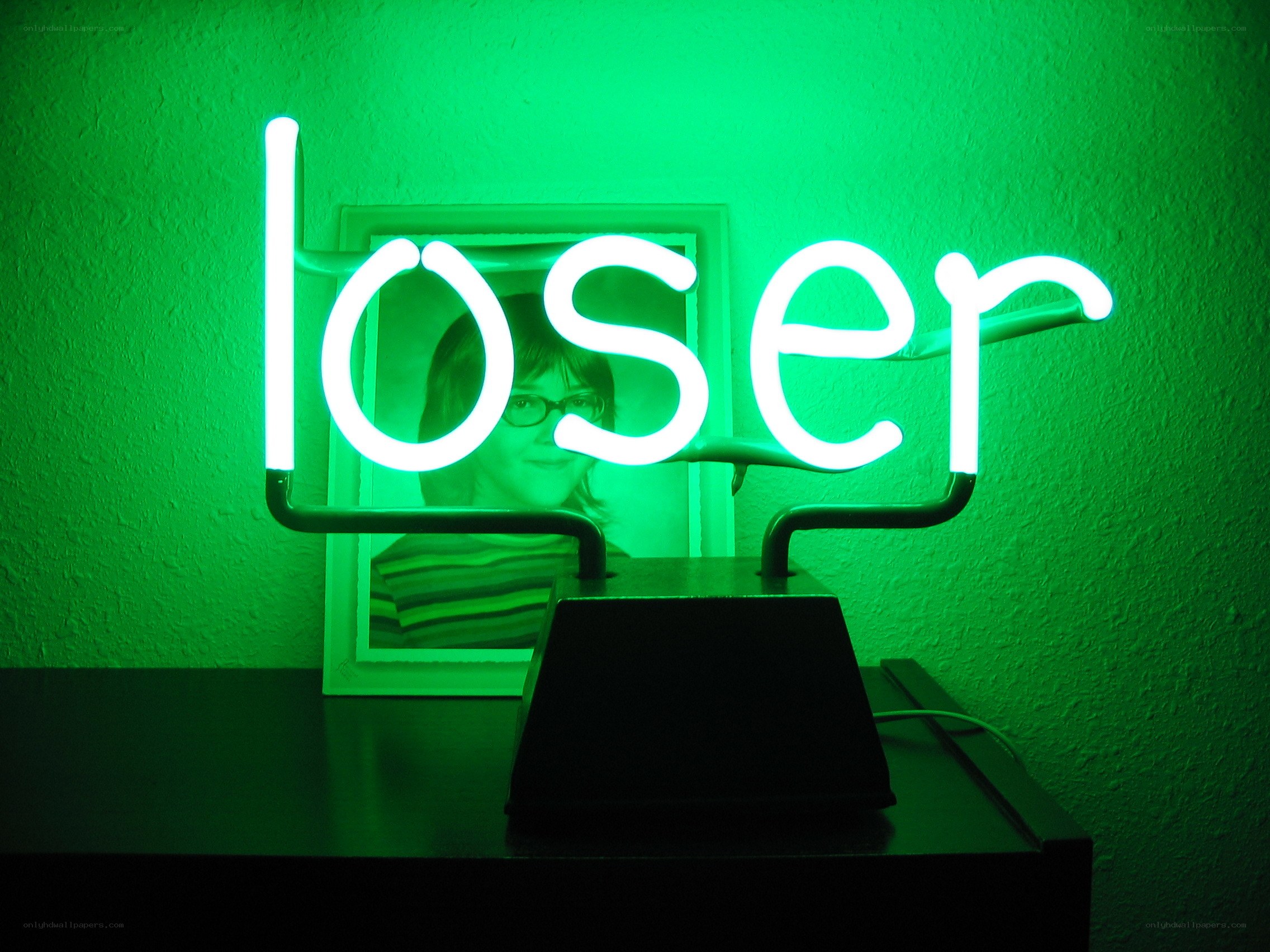 green neon 'loser' sign