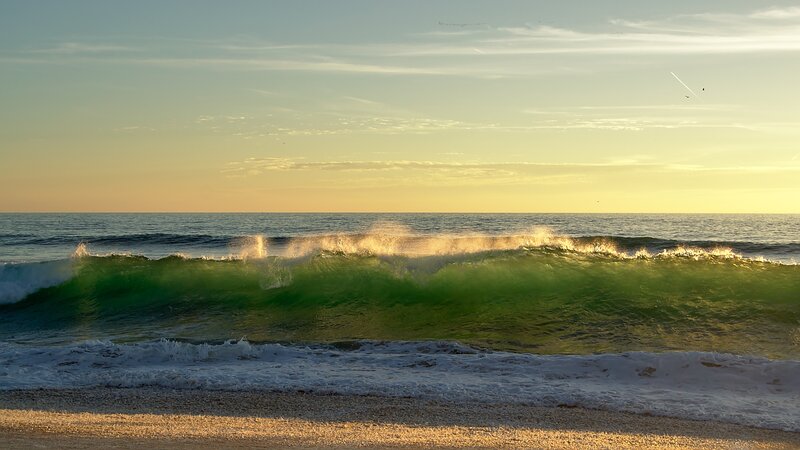 Green Ocean Wave — Serene, Sunset