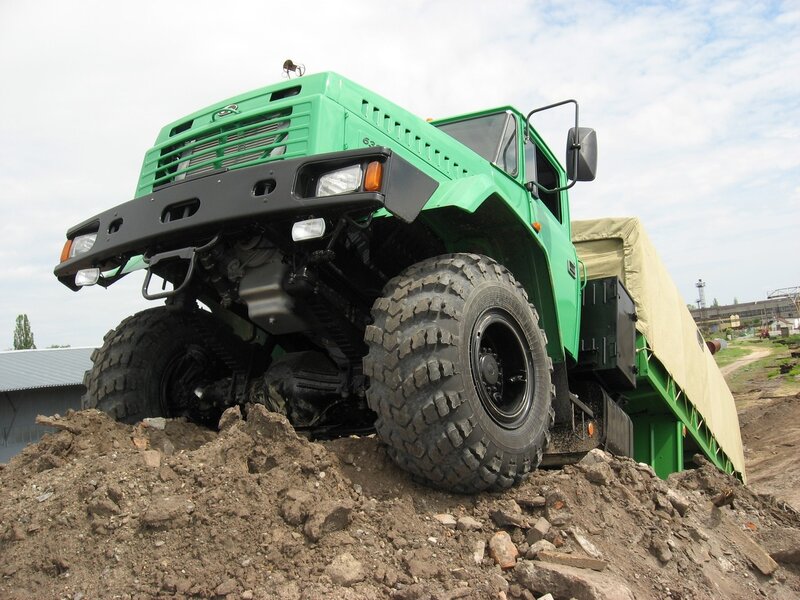 green off-road truck on dirt