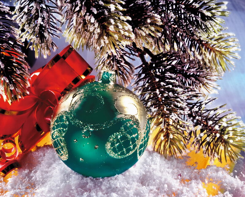 Green Ornament on Snow — Festive