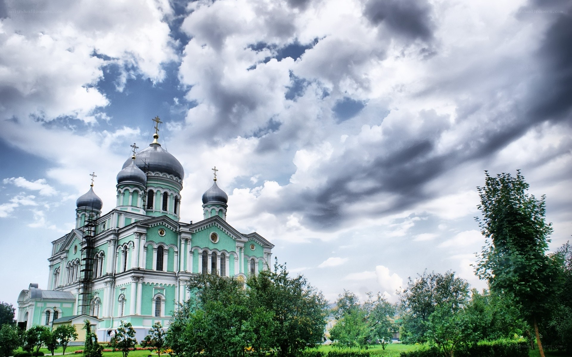 Green Orthodox Church with Cloudy Sky