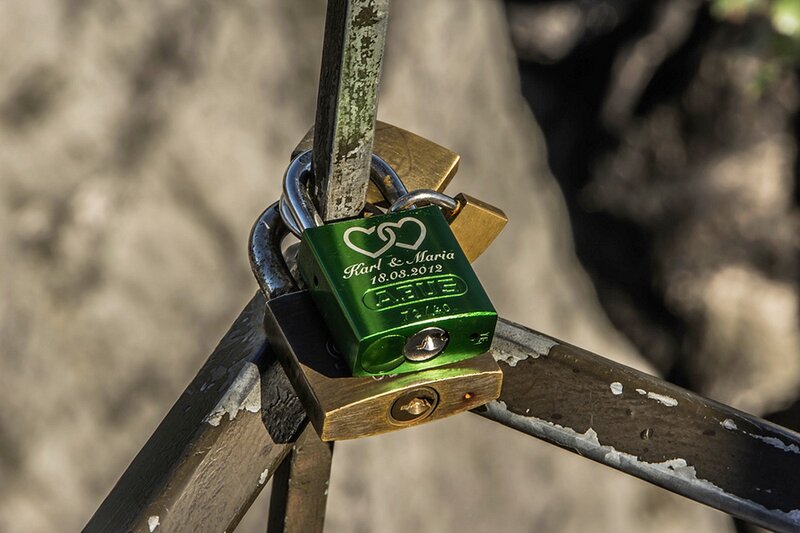 Green Padlock on Rail