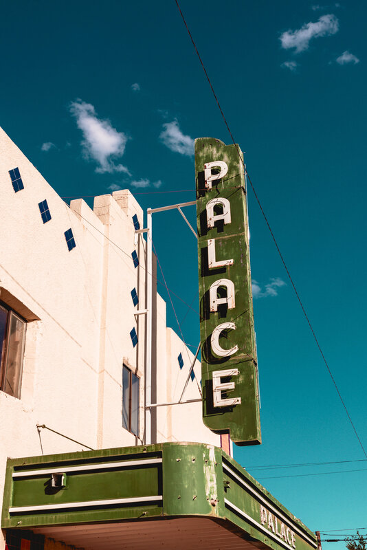 Green Palace Sign