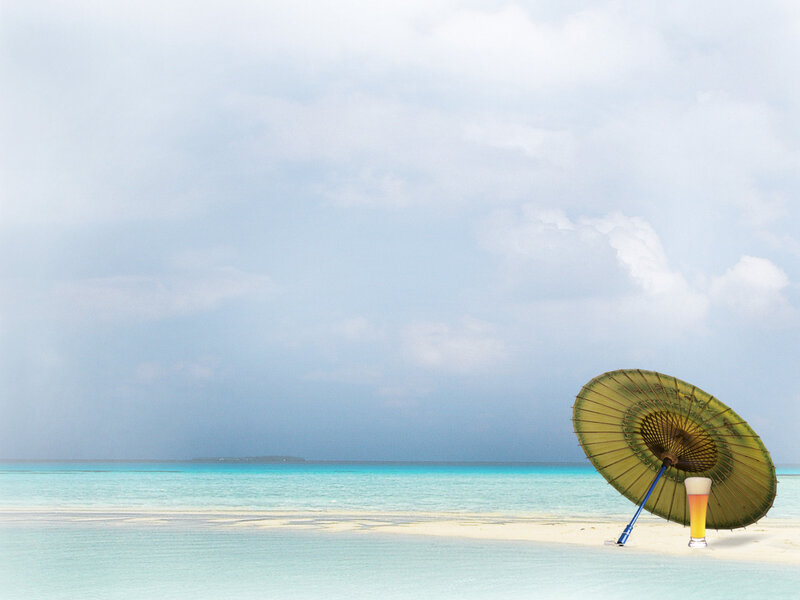 Green Parasol on Beach