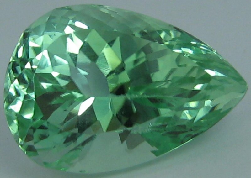 green pear-shaped gemstone