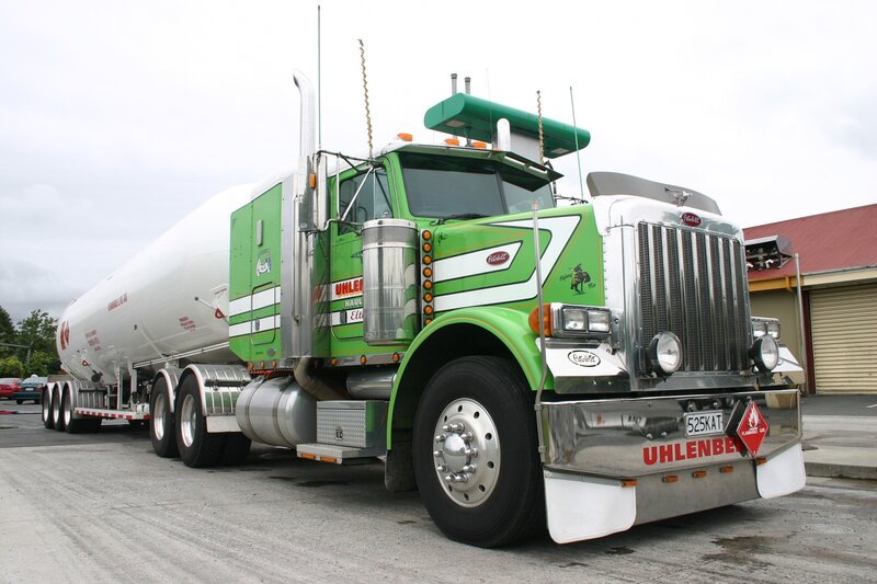 green petro truck with tank trailer